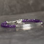 Handmade Amethyst gemstone bracelet with textured Argentium Silver bar and faceted purple beads