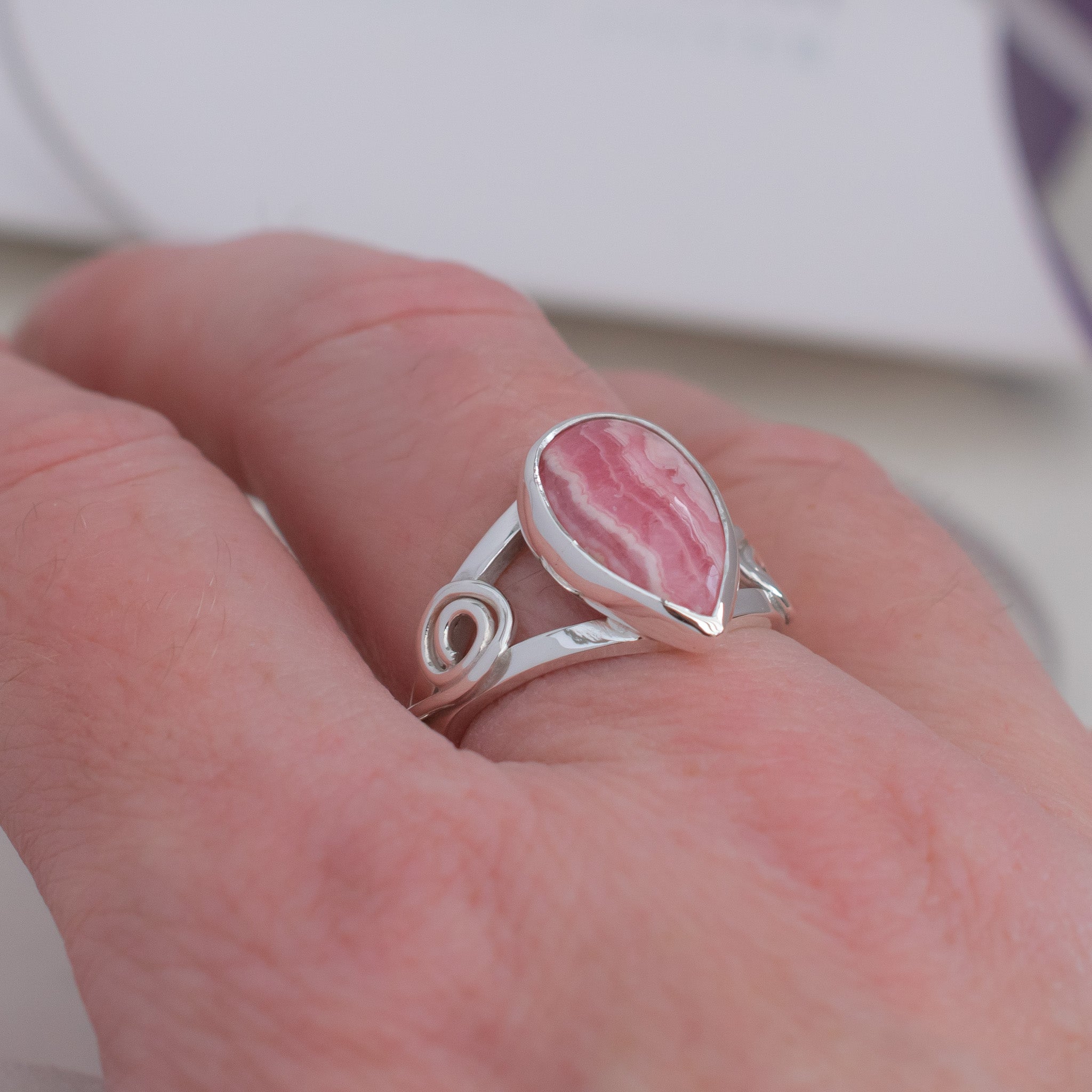 Rhodochrosite Ring in Celtic Swirl Argentium Silver band, UK size O ½