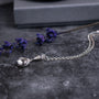 Sterling silver pebble pendant with a handmade swirl bail and an sdjustable belcher chain. 