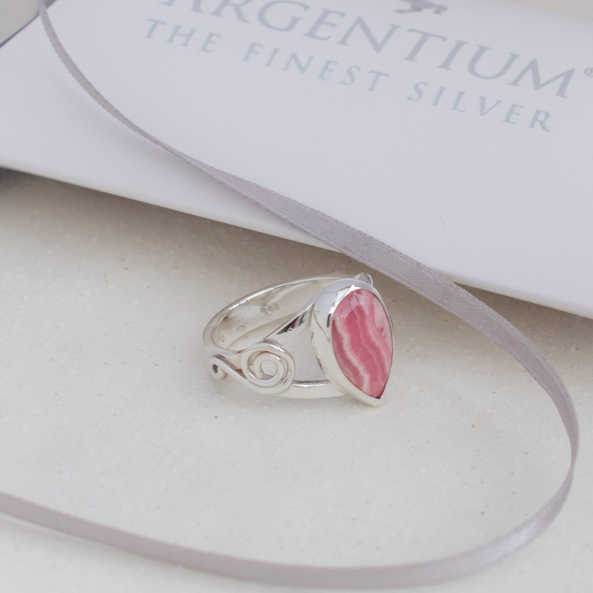 Rhodochrosite Ring in Celtic Swirl Argentium Silver band, UK size O ½