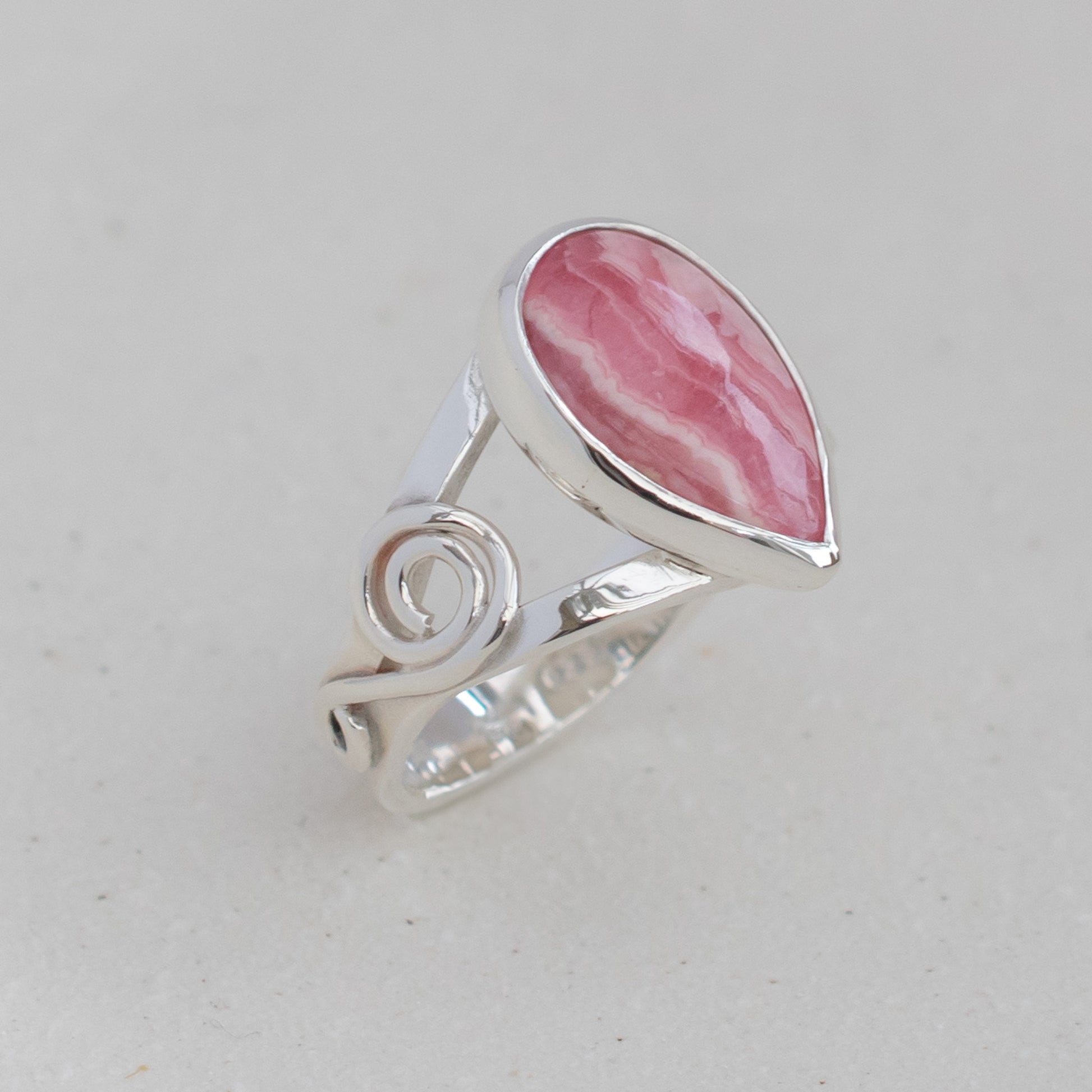 Rhodochrosite Ring in Celtic Swirl Argentium Silver band, UK size O ½