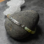 Handmade Grossular Garnet bracelet with Celtic patterned Sterling Silver bar