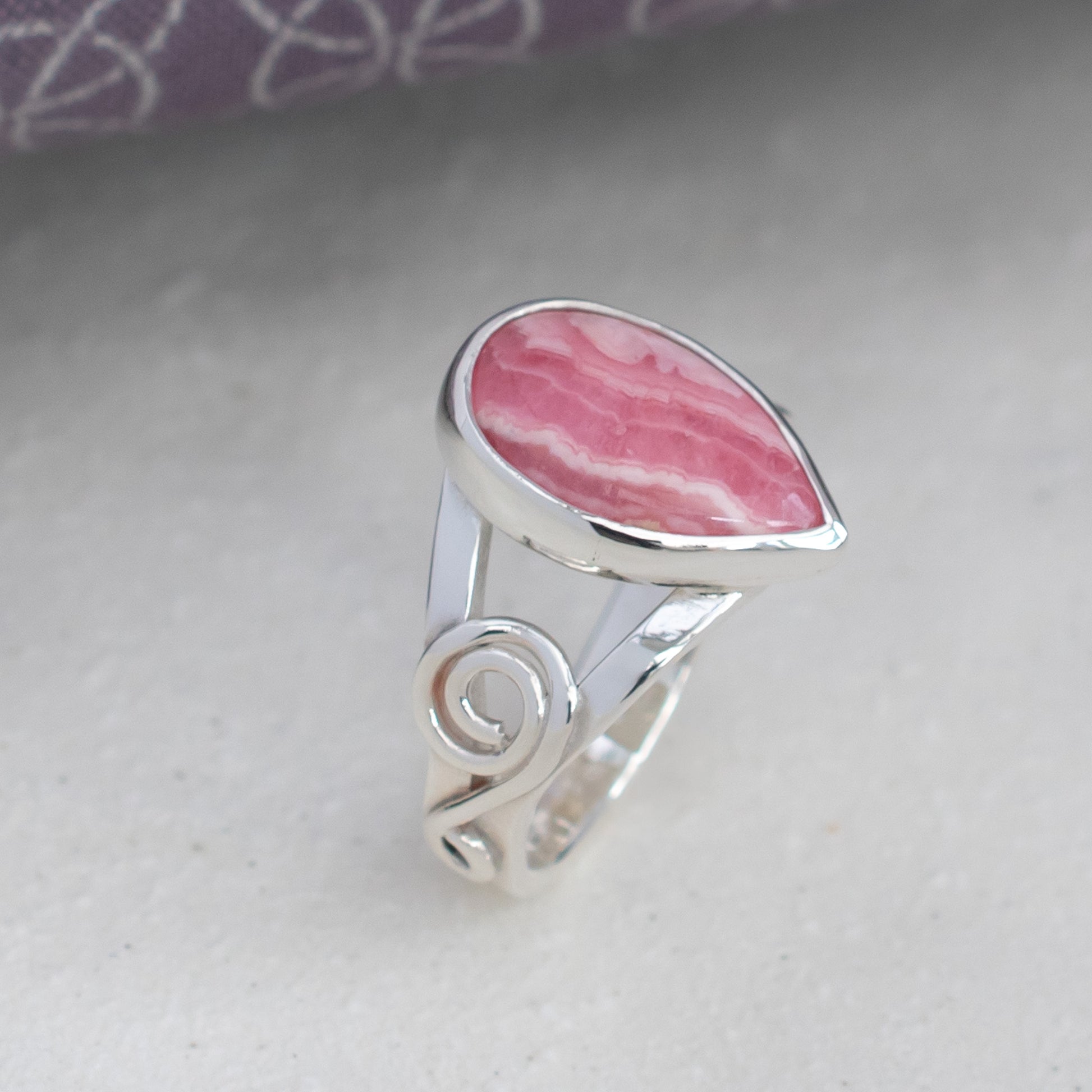 Rhodochrosite Ring in Celtic Swirl Argentium Silver band, UK size O ½