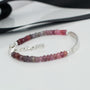 Handcrafted Argentium silver clasp and adjustable extension chain with small handmade silver charm on spinel bracelet