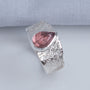 Wide textured silver ring band tapering at the back for comfort, UK size O